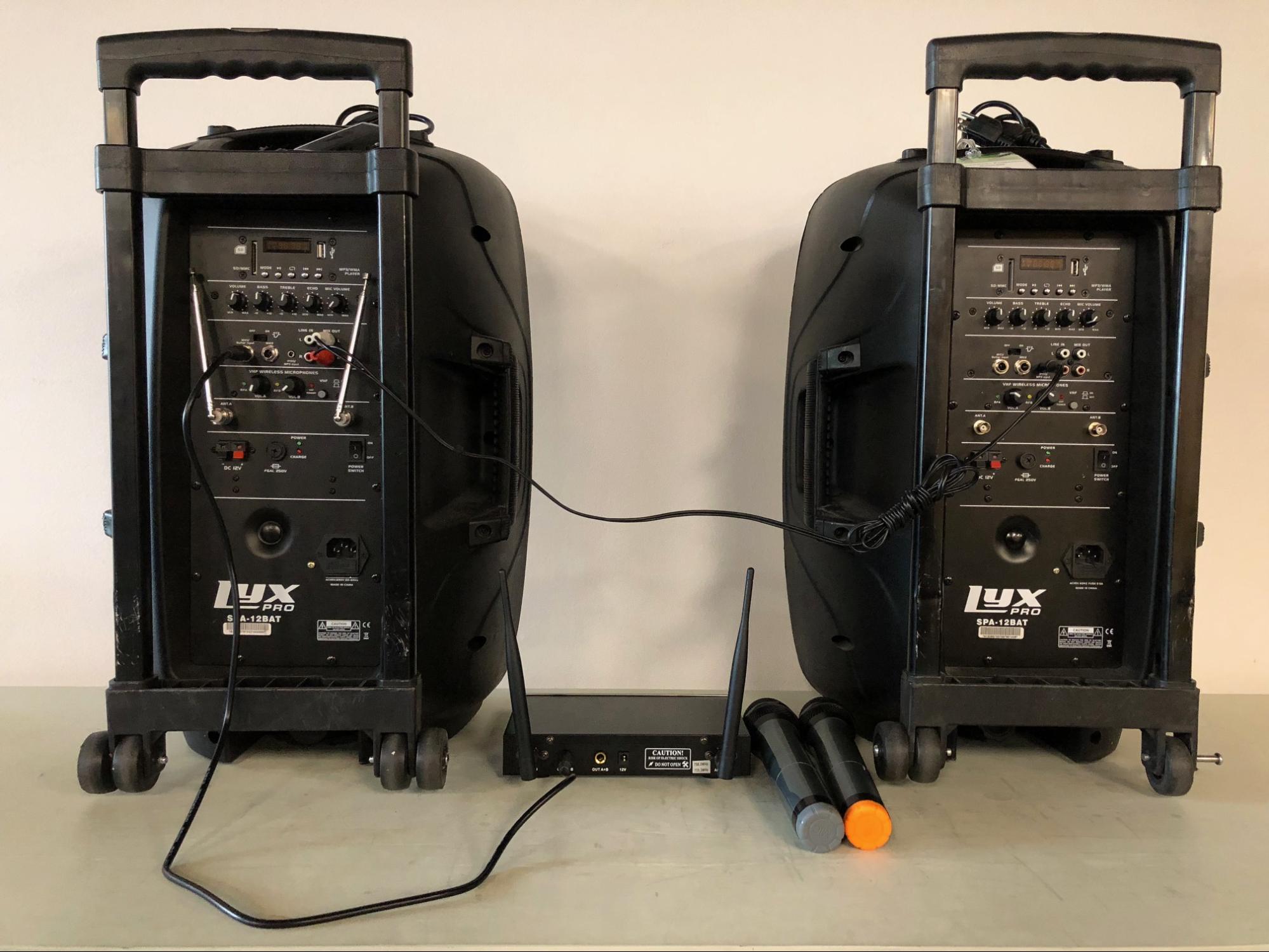2x big speaker and mic receiver connected