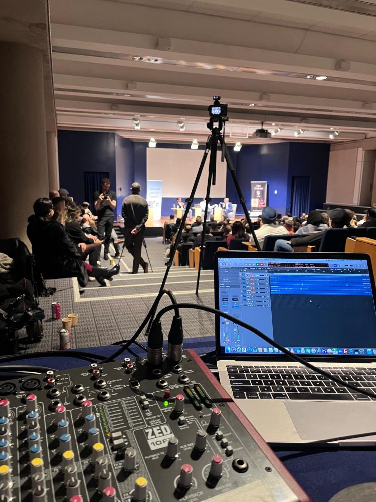 mixer rental for podcast recording in Vancouver laptop with an audio mixer on a table in an event