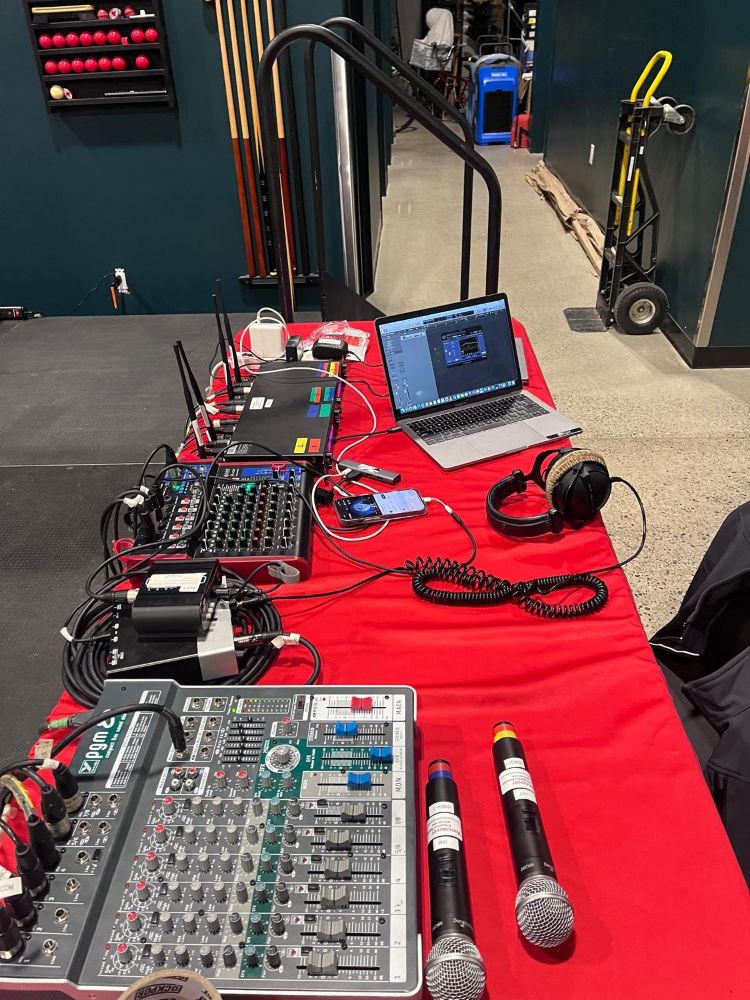 Audio recording equipment a laptop on a table