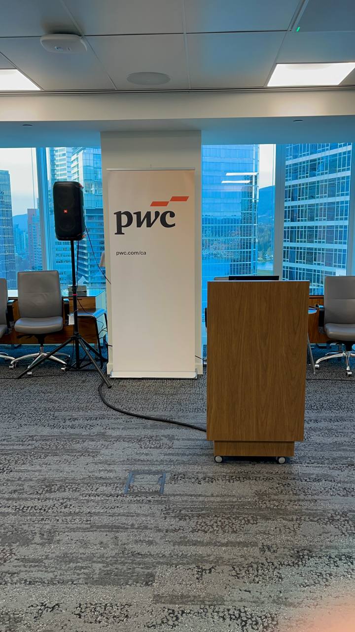 Portable speaker rental on an adjustable stand with wireless audio components in a corporate Vancouver event room