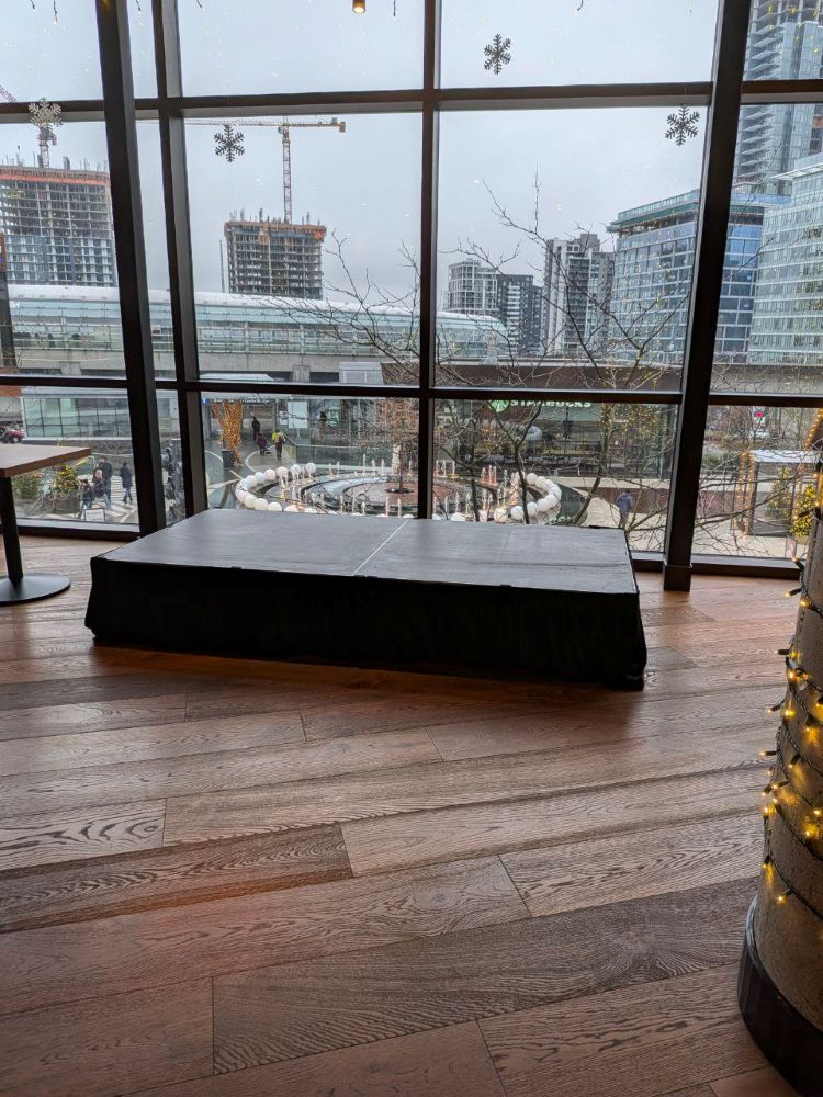 Portable stage rental in a modern Vancouver indoor venue