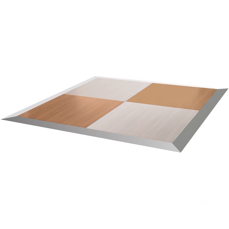 Modular wood and white checkered dance floor tiles assembled with sloped metallic trim